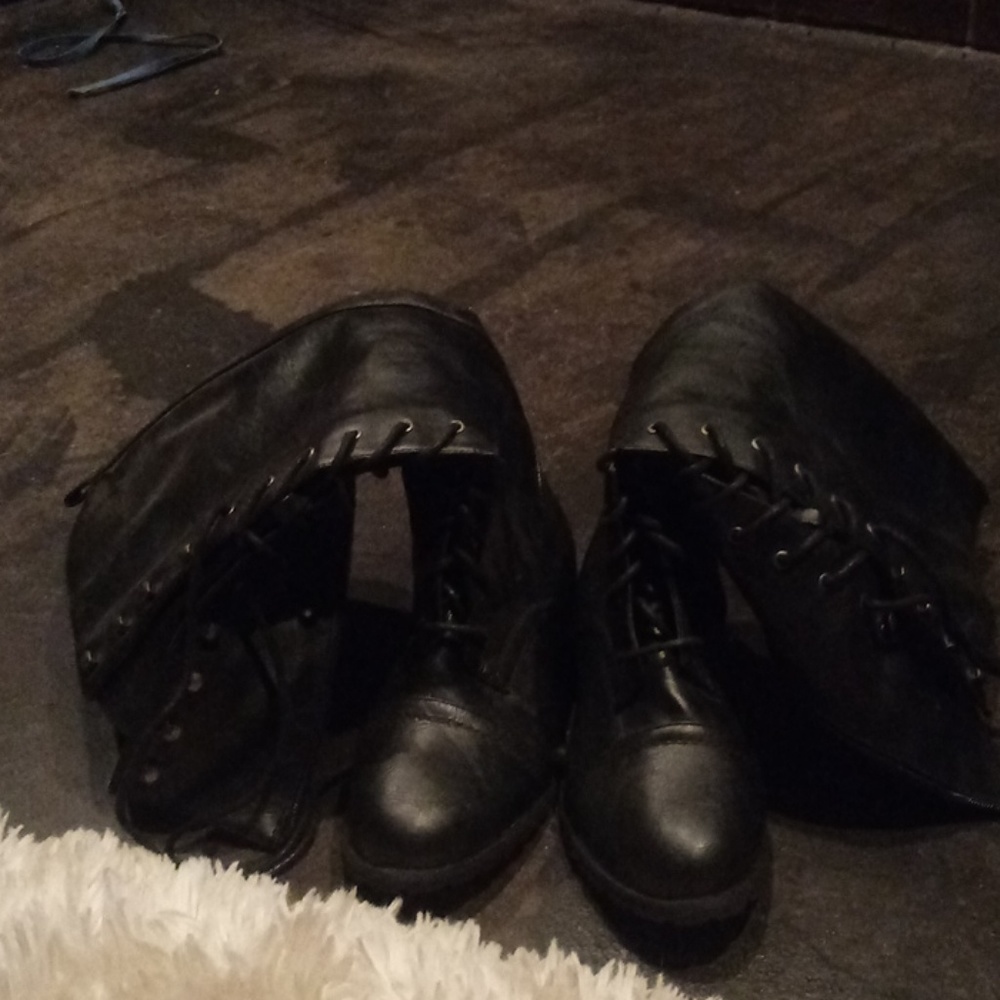 Black laced up boots